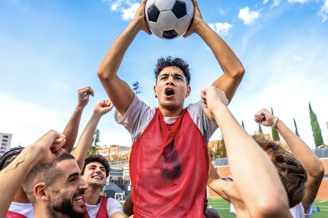 Friends celebrating a soccer game