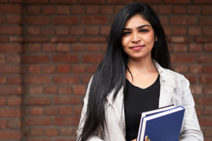 A women with a book on myopia management in children