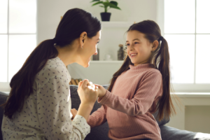 Parent comforting child with myopia