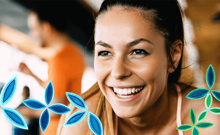 woman smiling and exercising