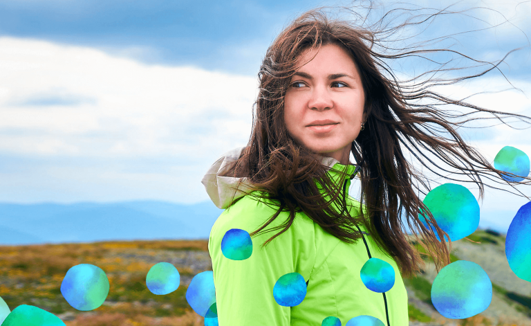 woman smiling outdoors
