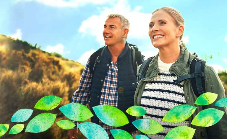 mature man and woman smiling outdoors