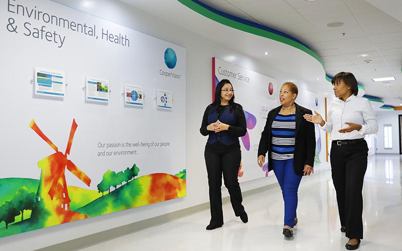 CooperVision employees walking in the office